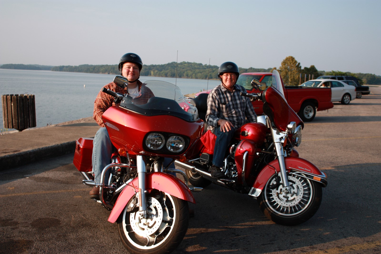 Dad and Jeff on Harleys by the lake on their first rental trip